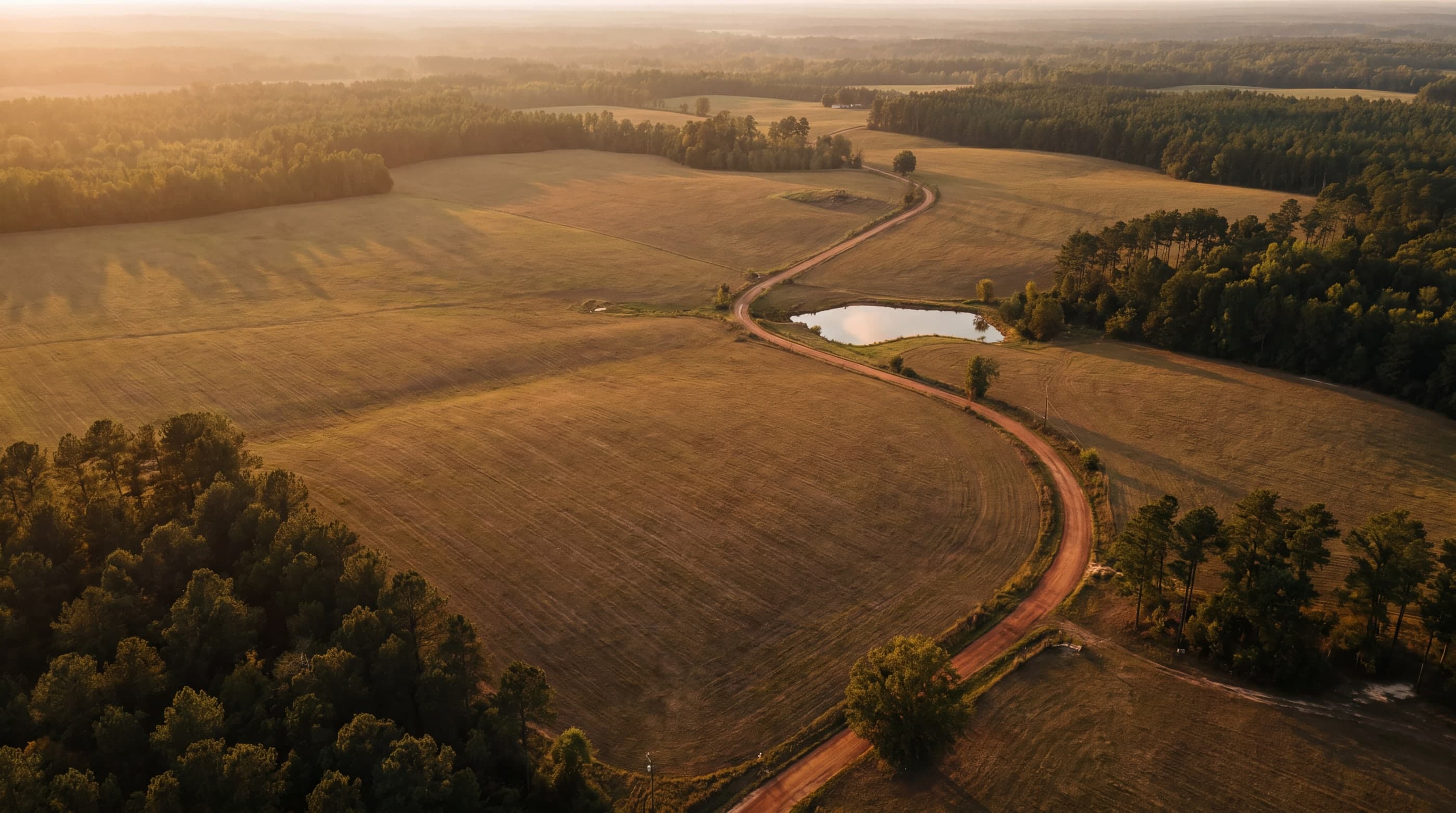 Multi-generational Southern land holding at golden hour